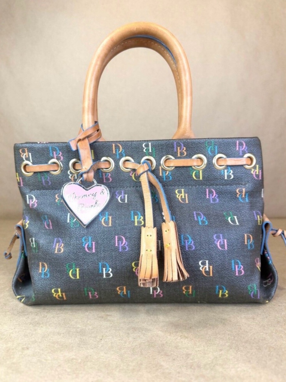 Dooney & Bourke Vintage Rainbow Monogram Tassel Satchel Handbag Coated Canvas